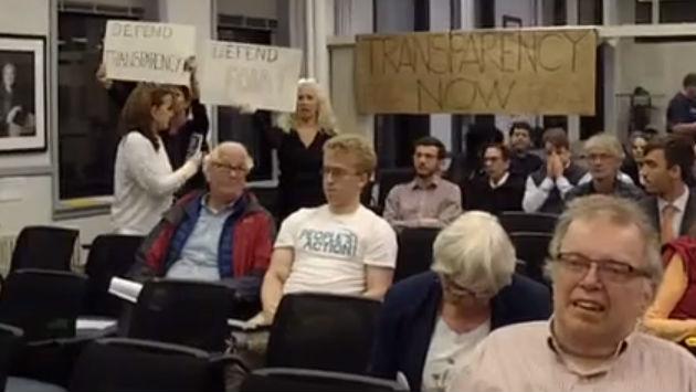protest-signs-in-council-chamber-20190528